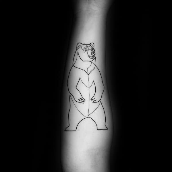 Minimalist continuous line tattoo of a standing bear on the forearm, featuring bold black ink with geometric elements for a strong and artistic design.