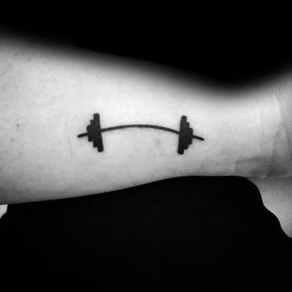 Simple black barbell tattoo on the forearm, symbolizing strength, fitness dedication, and a passion for weightlifting or CrossFit.