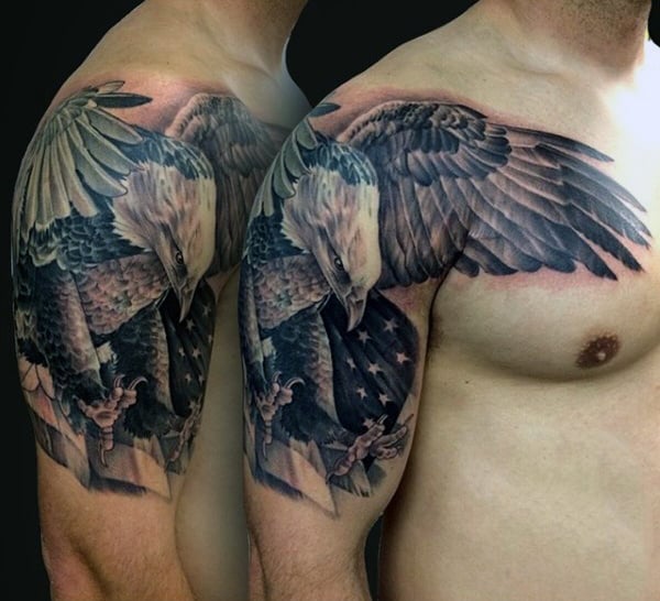 Tattoo of an eagle landing on an arm, with wings spread and claws out