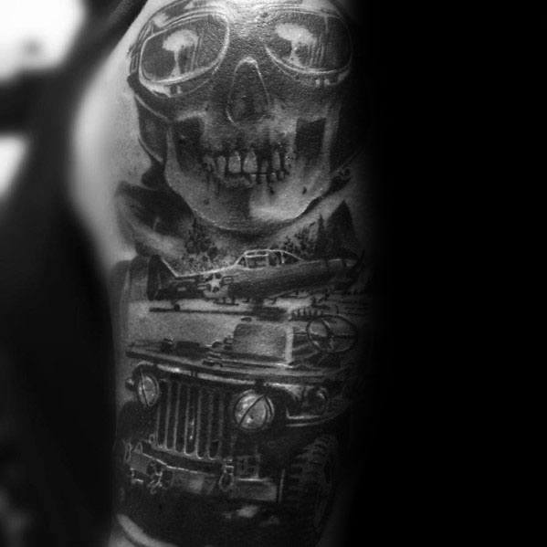 Realistic black and grey tattoo featuring a military Jeep, a skull wearing aviator goggles, and a warplane, creating a bold wartime-inspired design.