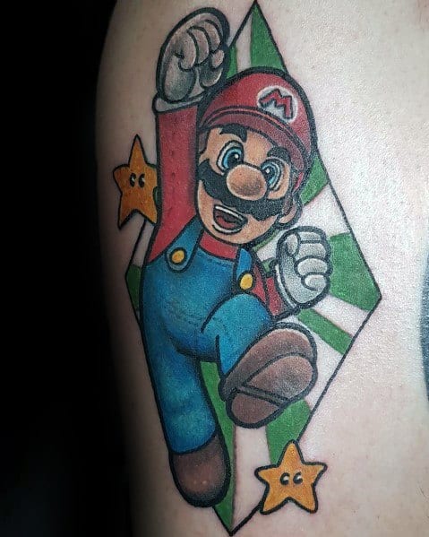 Bold *Super Mario* tattoo featuring Mario mid-jump with Super Stars, framed by a green geometric background for a vibrant and dynamic gaming design.