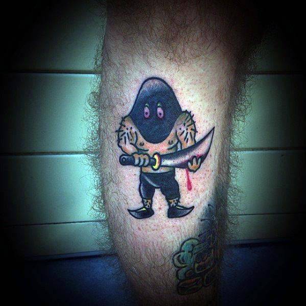 Cartoon-style executioner tattoo featuring a hooded figure with glowing eyes, holding a bloodied sword, with bold outlines and shading.
