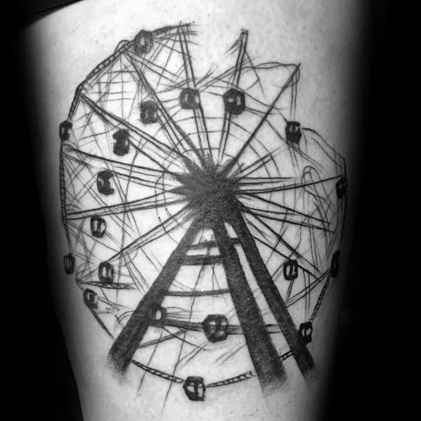 Sketch-style Ferris wheel tattoo with bold shading and rough, dynamic line work, creating a raw and artistic hand-drawn effect.