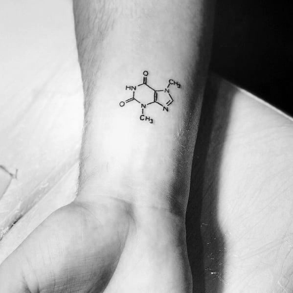 Minimalist tattoo of the chemical structure of theobromine, the compound found in chocolate, placed on the wrist in fine black ink.