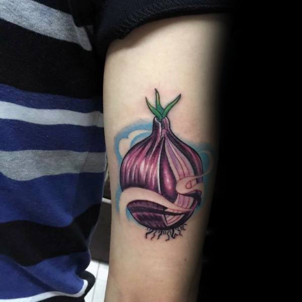 Colorful tattoo of a purple onion with a peeled layer forming a ribbon-like shape, surrounded by soft blue shading for a dynamic and artistic look.