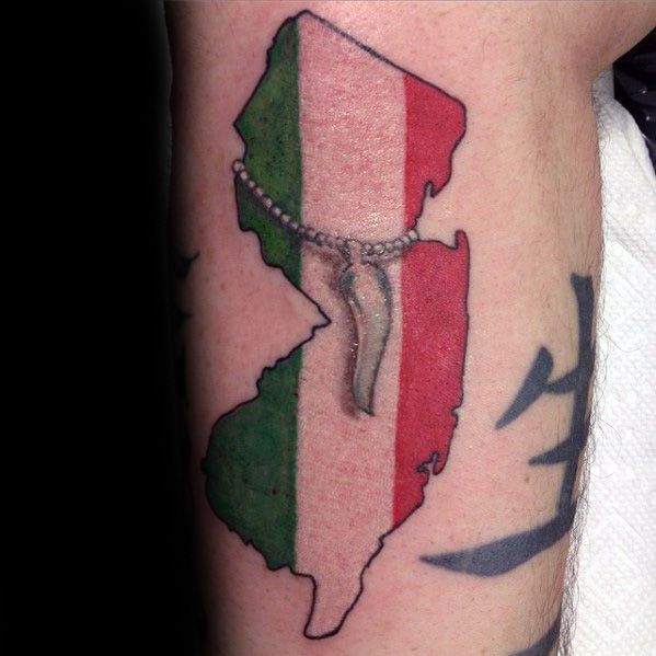 New Jersey-shaped tattoo with an Italian flag design and an Italian horn pendant, symbolizing heritage and cultural pride.