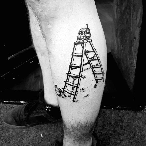 Creative ladder tattoo featuring a skull atop an A-frame ladder, symbolizing risk and mortality, ideal for men's calf tattoos.