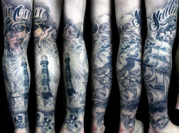A full-sleeve tattoo featuring a nautical theme with lighthouses, waves, and ships