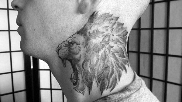 Roaring lion neck tattoo with detailed shading and a flowing mane, creating a bold and fierce design that symbolizes strength and bravery.