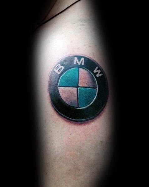Realistic BMW logo tattoo on upper arm, featuring bold shading and a 3D effect for a striking automotive-inspired design.