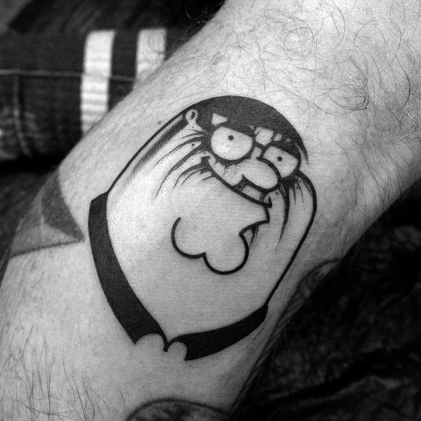 Tattoo of Peter Griffin from *Family Guy* in a bold black ink design, stylized with exaggerated features and a dripping effect.