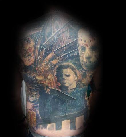 Full back tattoo featuring horror icons Michael Myers, Jason Voorhees, and Freddy Krueger, with eerie details and a dark cinematic atmosphere.
