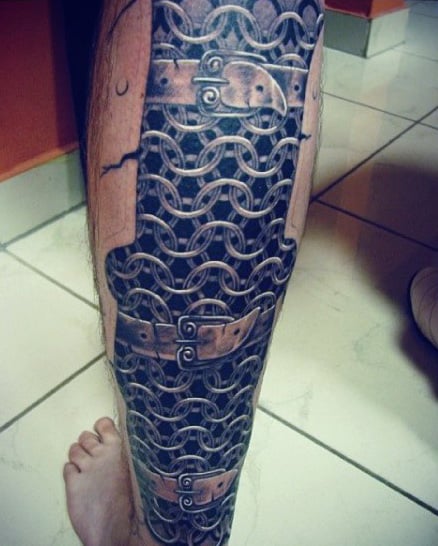 Tattoo Of Chains On Man On Legs