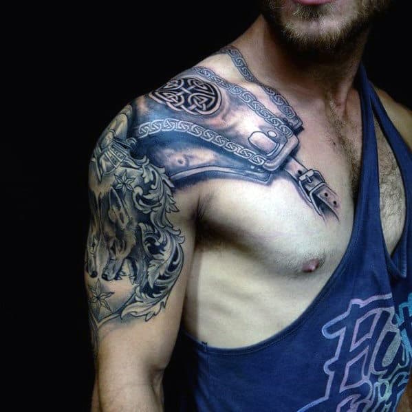 Armor tattoo on the shoulder and upper arm