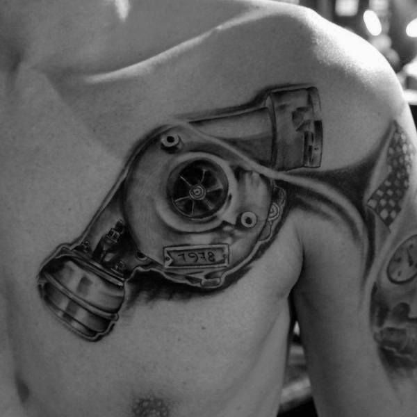 Realistic **turbocharger and piston** tattoo on the chest and shoulder with fine shading, symbolizing speed, mechanical power, and automotive passion.