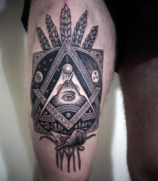 Black and grey tattoo of an eye in a pyramid with cosmic and natural elements