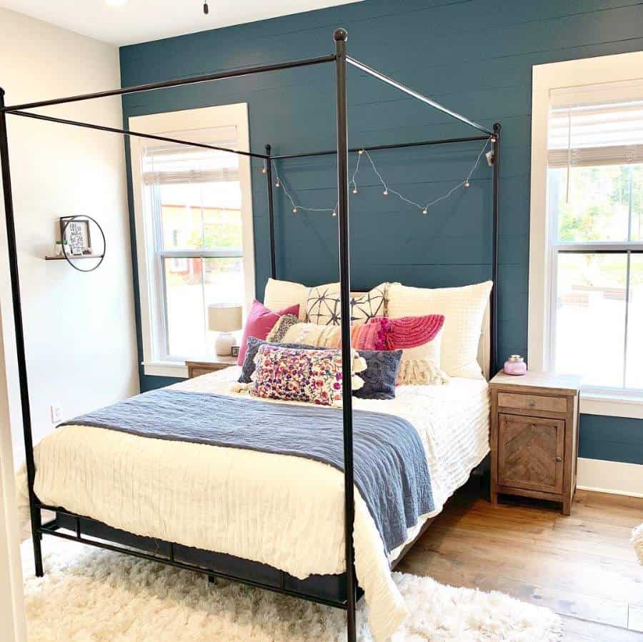 blue shiplap feature wall four post bed