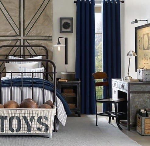 vintage style bedroom iron bed frame blue curtains toys basket