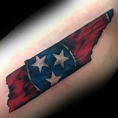 Tennessee state-shaped tattoo with the three-star emblem, featuring a bold red and blue distressed flag design for a rugged patriotic look.