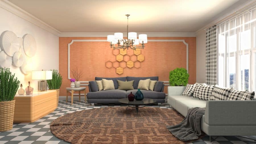 Stylish living room with an accent wall, two sofas, patterned rug, wall art, plants, and a chandelier on a checkered floor