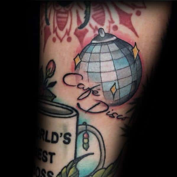 Color tattoo featuring a disco ball with the words "Café Disco," referencing Michael Scott’s makeshift dance lounge from *The Office*.