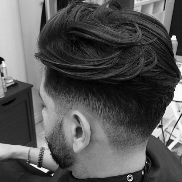 Thick Trendy Mens Hairstyle With Low Fade
