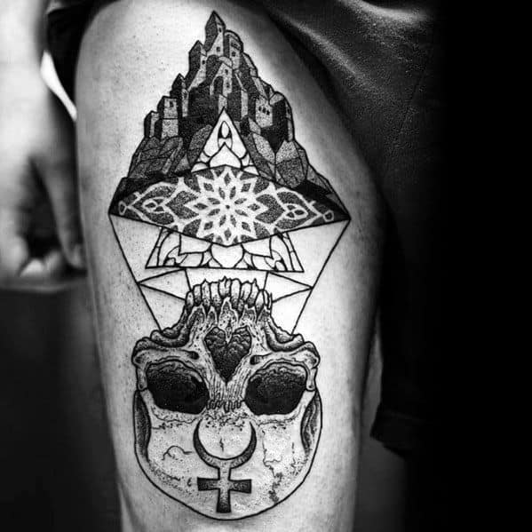 Surreal tattoo featuring a geometric mountain above a mandala, merging into a skull with the Venus symbol, evoking Escher-like symmetry and depth.