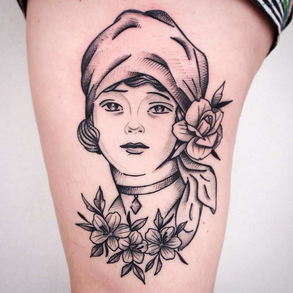 A vintage-style tattoo depicting a gypsy woman's face adorned with a headscarf and surrounded by roses