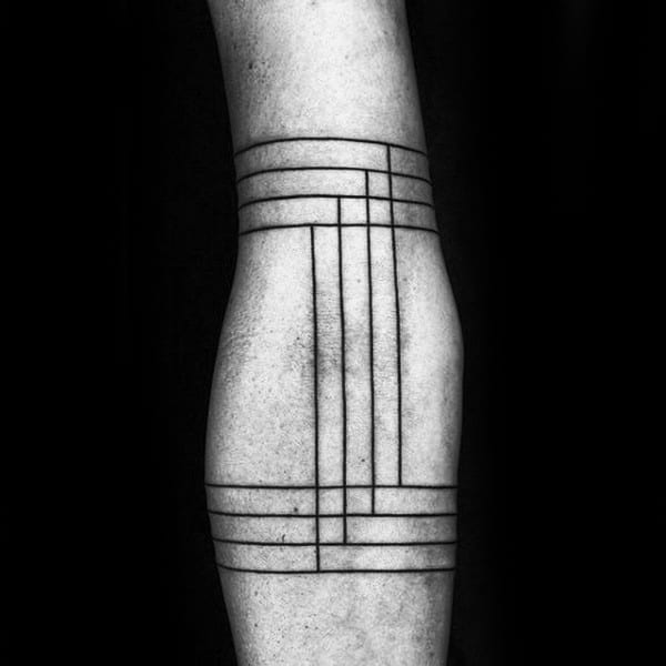 Geometric line tattoo with intersecting black lines encircling an arm