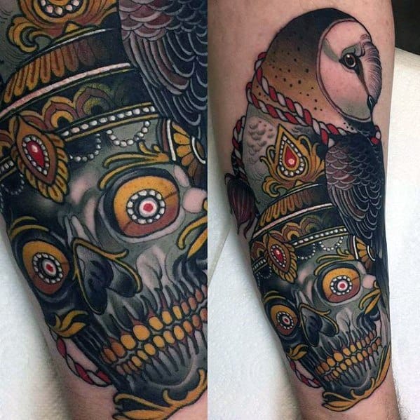 Tibetan skull tattoo with gold and red crown elements, paired with a realistic owl perched above, blending mysticism and nature.