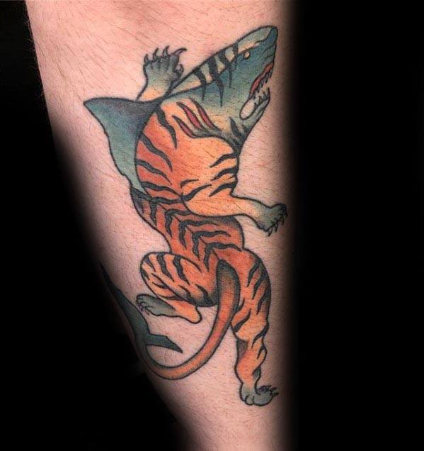 Creative tiger shark hybrid tattoo with a tiger’s body and shark’s head, blending fierce features in a bold and imaginative design.