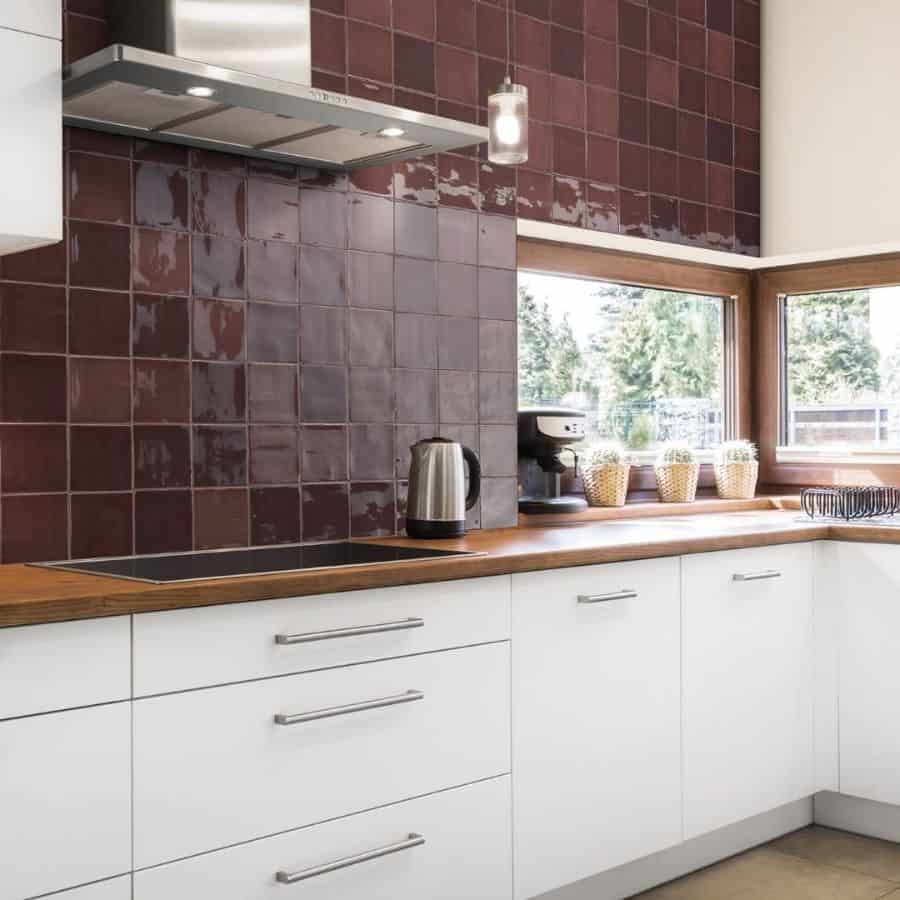 red tile backsplash kitchen