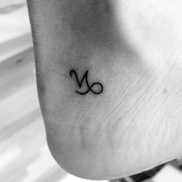 Tiny Capricorn Zodiac Sign On Foot With Black Ink