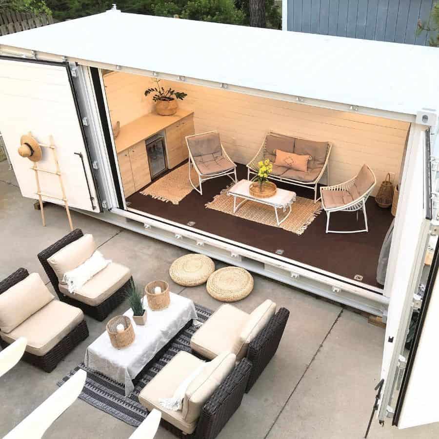tiny shipping container home in backyard