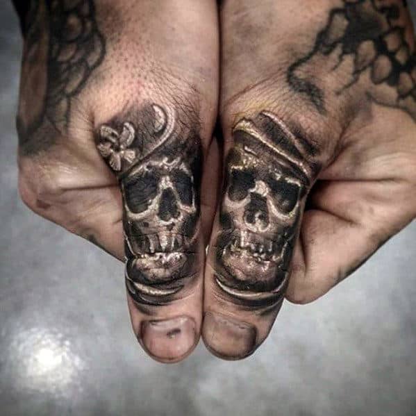 Tiny Skulls Guys Different Shaded Finger Tattoos