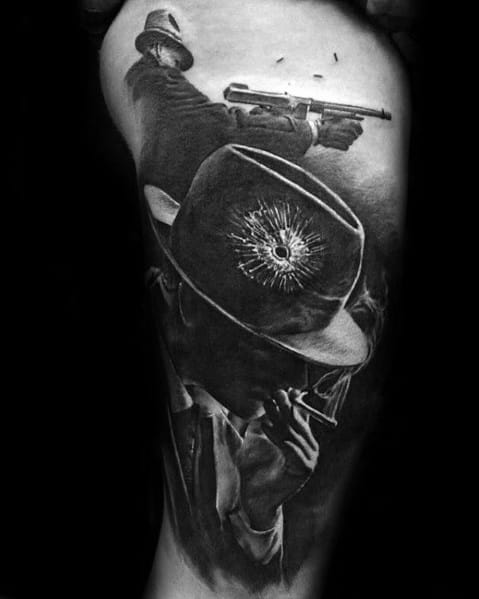 Realistic black and grey gangster tattoo featuring a fedora with a bullet hole, a smoking mobster, and a Tommy gun shooter, creating a dramatic crime scene.