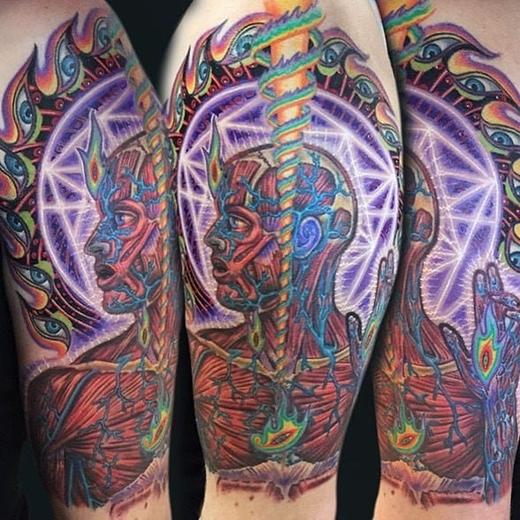 Vibrant Tool-inspired tattoo featuring a glowing geometric aura, abstract humanoid figure, fiery elements, and a cosmic, psychedelic background.