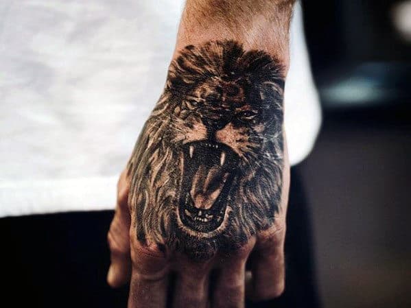 Top Of Hand Guys Lion Roaring Tattoo Design Inspiration