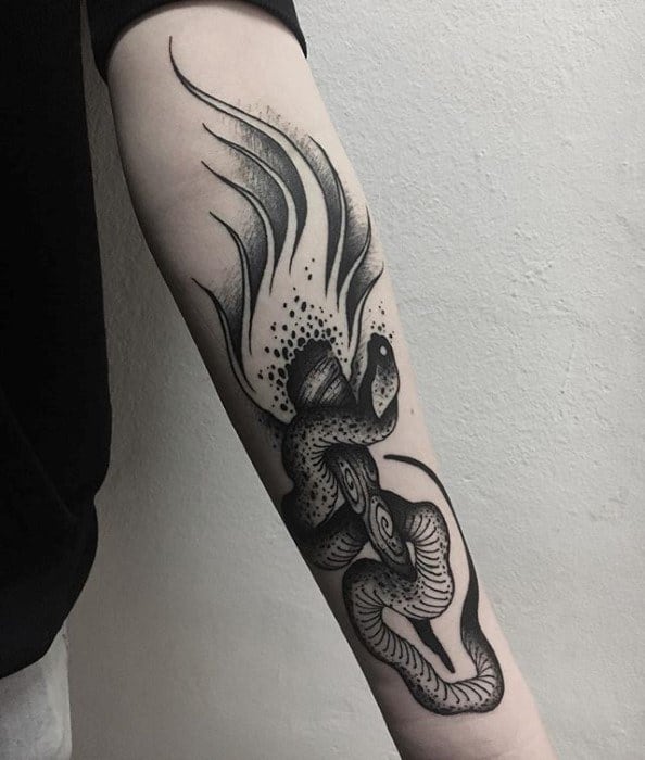 Blackwork torch tattoo with abstract flames and a detailed snake coiled around the handle, featuring stippling and fine line shading.