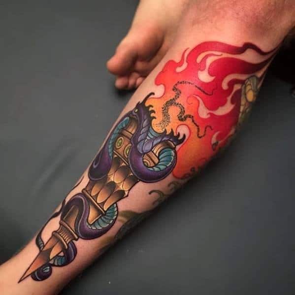 Colorful torch tattoo featuring a golden handle entwined with a blue snake, bright red flames, and a smoky background effect.