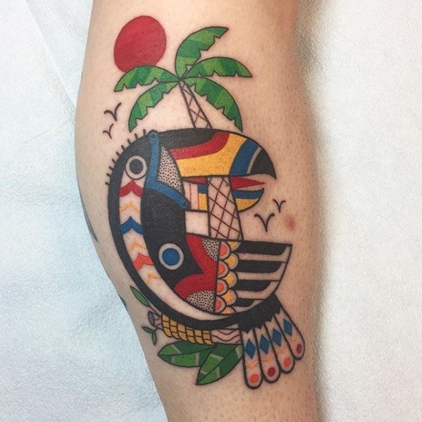 Geometric toucan tattoo with tribal patterns, palm trees, and a red sun, blending bold colors and shapes for a playful tropical vibe.
