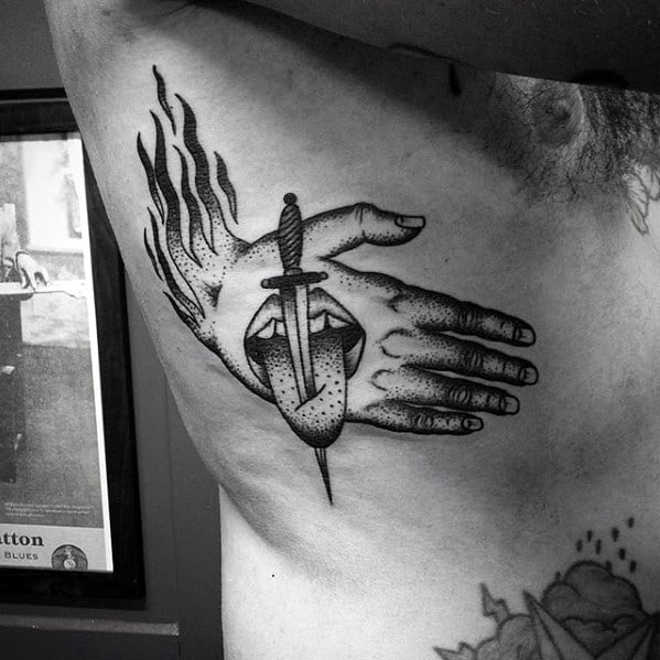 Tounge With Hand And Dagger Guys Traditional Rib Cage Side Tattoo