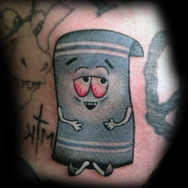 South Park tattoo of Towelie with red, half-closed eyes, featuring bold outlines, soft shading, and a classic stoned expression.