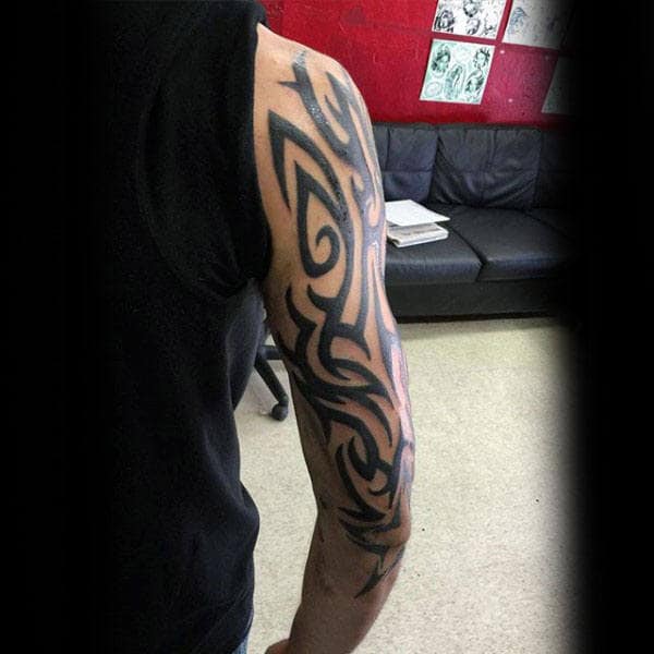 Traditional Arm Male Tribal Tattoo Design Ideas With Black Ink