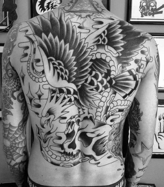 Traditional Black Ink Flying Eagle Skull Male Back Tattoo