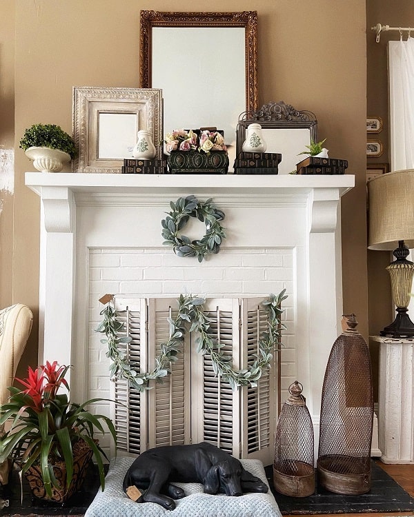 traditional white bricked up fireplace and mantel