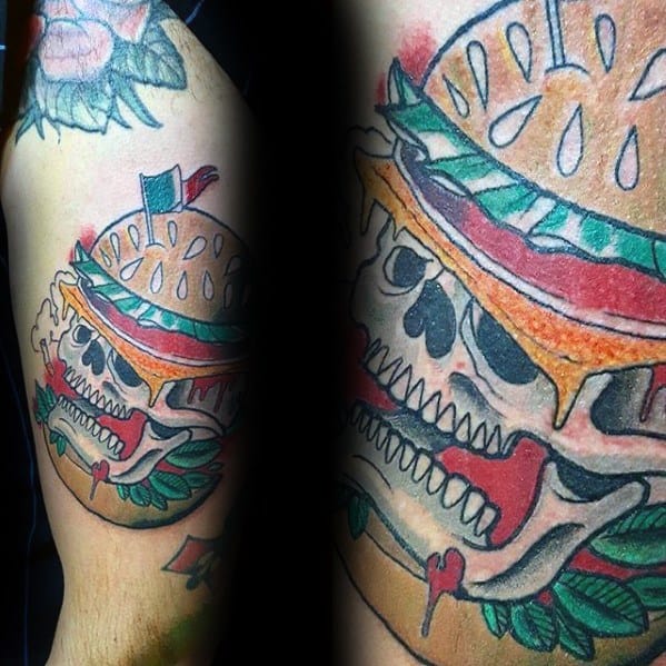 Cheeseburger tattoo design featuring a skull, dripping cheese, lettuce, tomato, and sesame seed bun