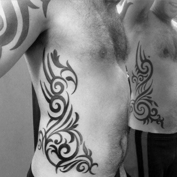 Traditional Ornate Mens Tribal Rib Black Ink Tattoos