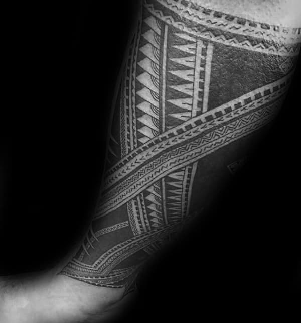 Traditional Tattoo Of Samoan Tribal Design On Guys Lower Legs