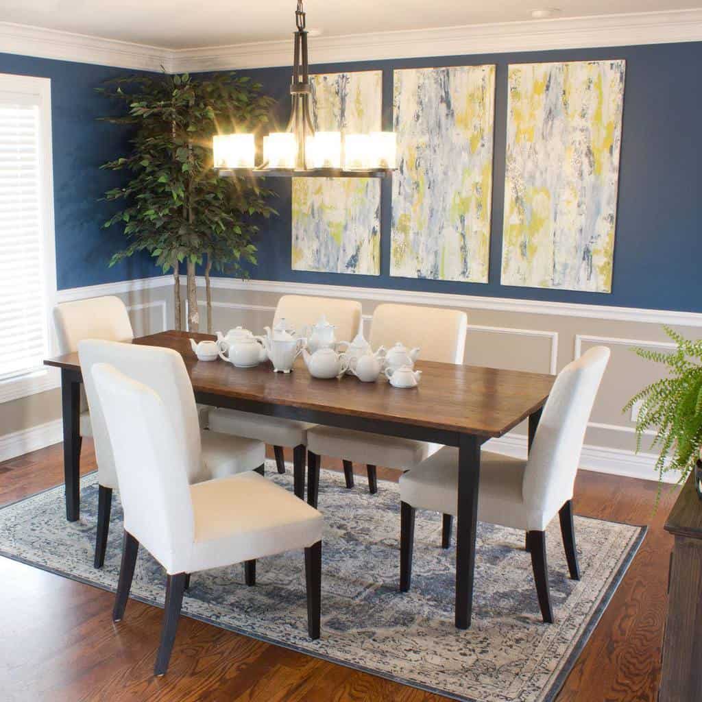 transitional dining room table with teapots abstract canvas wall art chandelier